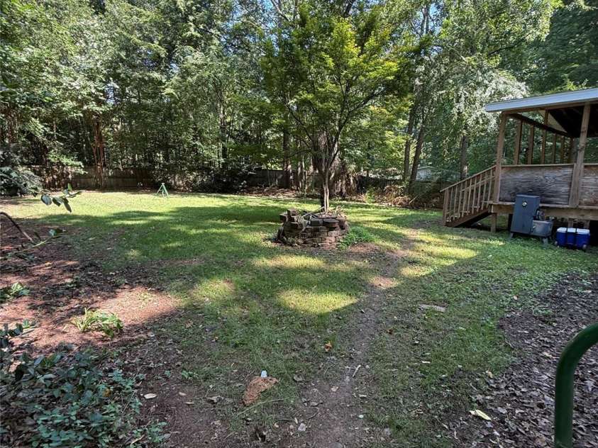 4014 Eutaw Drive, Waxhaw, NC 28173.  MLS# CAR4403095, YatesRealty ID 36667. Backyard Side view