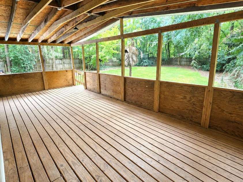 4014 Eutaw Drive, Waxhaw, NC 28173.  MLS# CAR4403095, YatesRealty ID 36667. Cleared Back Porch view
