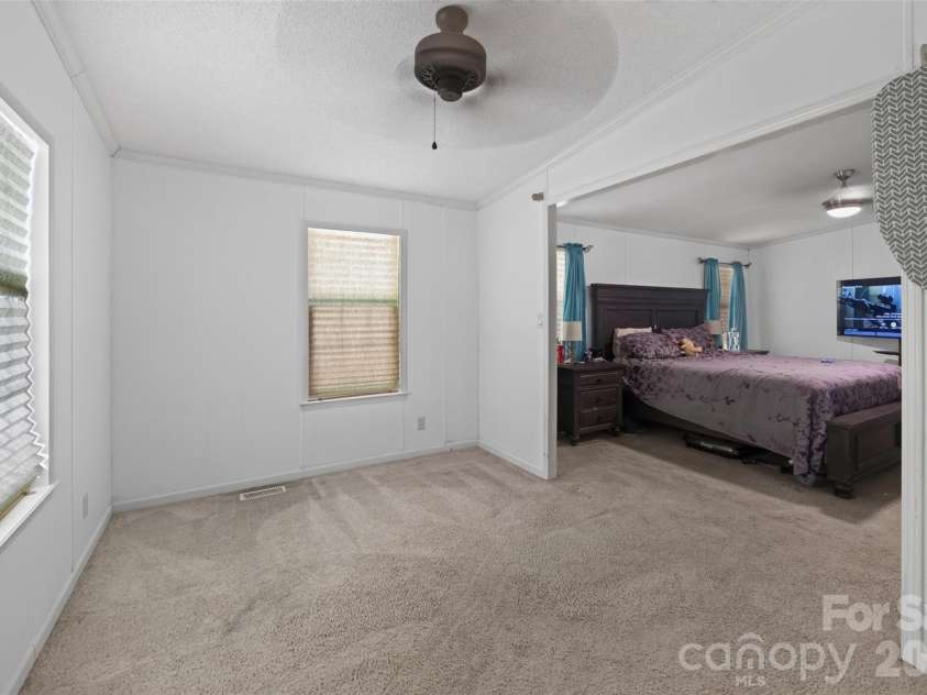 4014 Eutaw Drive, Waxhaw, NC 28173.  MLS# CAR4403095, YatesRealty ID 36667. Flex Area in Master Suite can serve as lounge area, library, glam area, or office