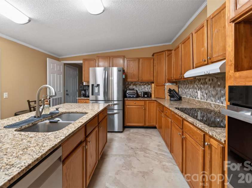 4014 Eutaw Drive, Waxhaw, NC 28173.  MLS# CAR4403095, YatesRealty ID 36667. Kitchen view from Dining Area
