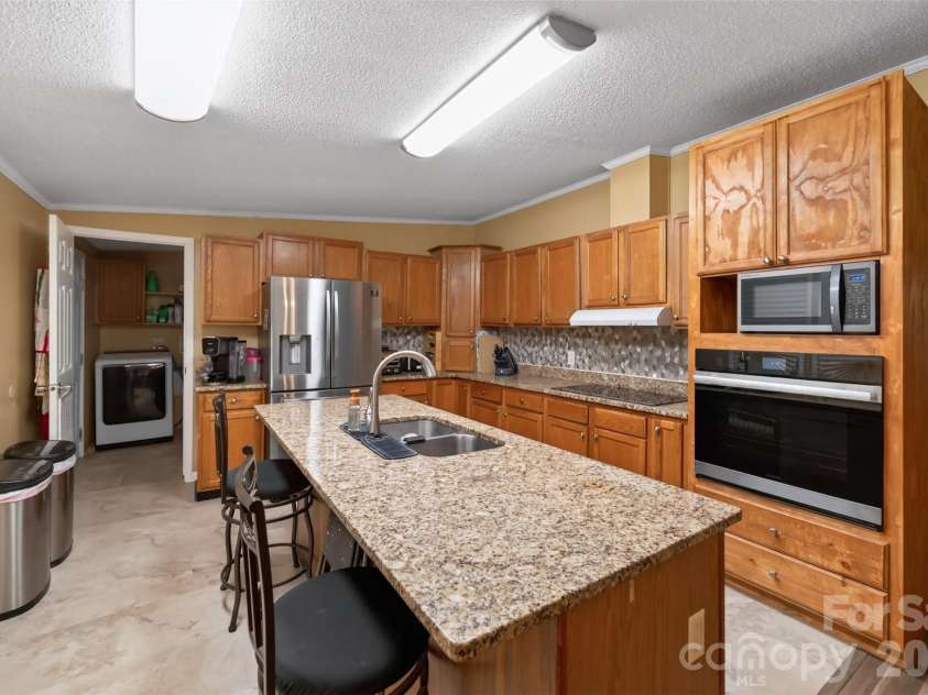 4014 Eutaw Drive, Waxhaw, NC 28173.  MLS# CAR4403095, YatesRealty ID 36667. Kitchen with Breakfast island