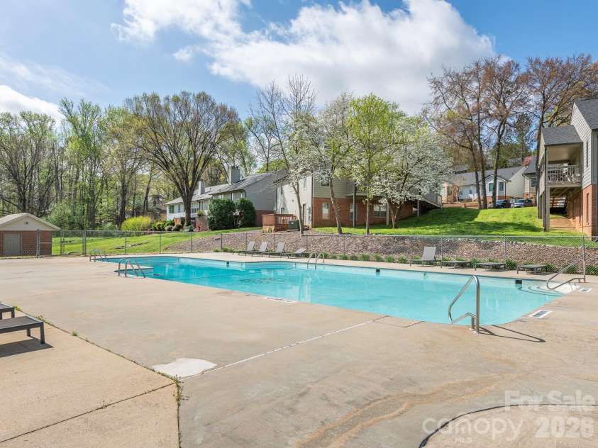 1005 Kenilworth Court, Concord, NC 28027.  MLS# CAR4403489, YatesRealty ID 36682. Community pool