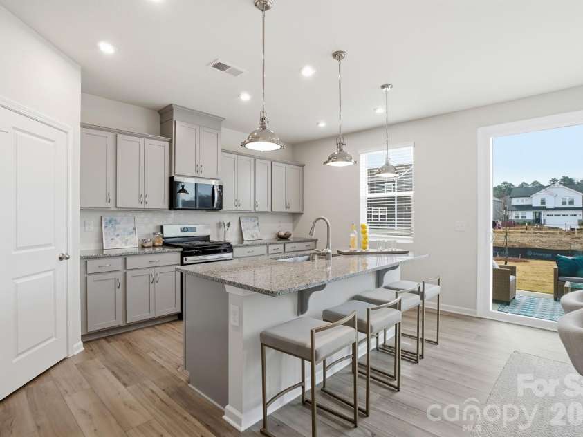 1460 McCollum Street, Monroe, NC 28112.  MLS# CAR4403889, YatesRealty ID 36693. Kitchen