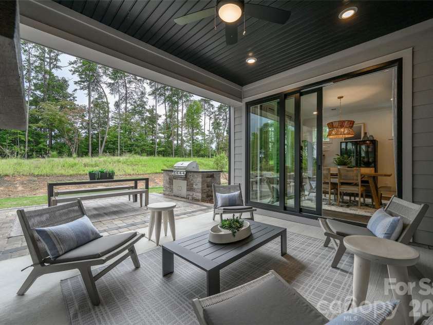 109 Windy Dell Drive, Tega Cay, SC 29708.  MLS# CAR4403963, YatesRealty ID 36703. Covered patio