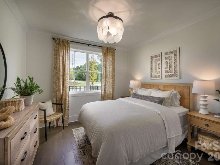 109 Windy Dell Drive, Tega Cay, SC 29708.  MLS# CAR4403963, YatesRealty ID 36703. Guest bed on main level