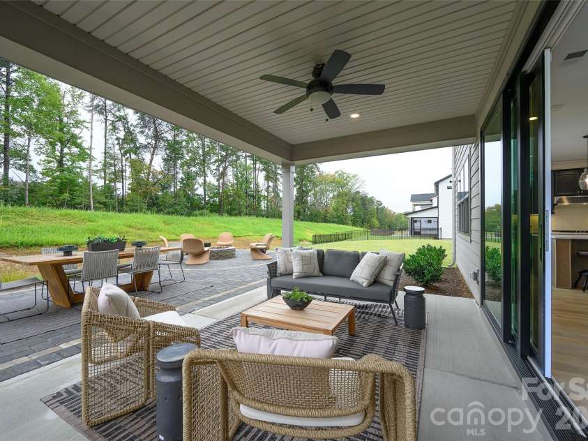 113 Windy Dell Drive, Tega Cay, SC 29708.  MLS# CAR4403996, YatesRealty ID 36706. Outdoor covered patio