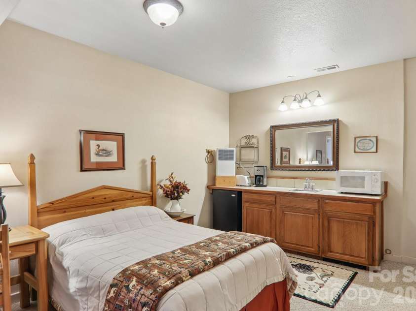 1061 Setzer Cove Road, Maggie Valley, NC 28751.  MLS# CAR4404005, YatesRealty ID 36708. 
