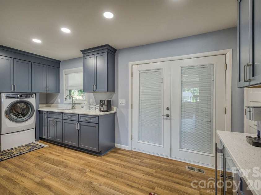 214 Howard Street, Morganton, NC 28655.  MLS# CAR4284499, YatesRealty ID 3671. Leading to Screened-In Porch