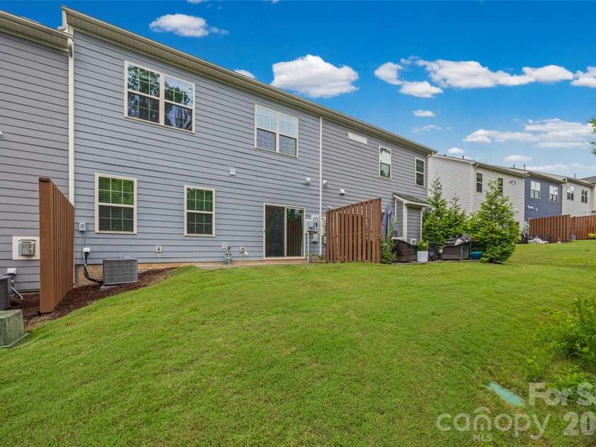 623 Amber Meadows Way, Fort Mill, SC 29708.  MLS# CAR4402607, YatesRealty ID 36714. Back View of home