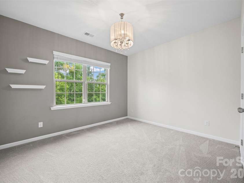 623 Amber Meadows Way, Fort Mill, SC 29708.  MLS# CAR4402607, YatesRealty ID 36714. Bedroom # 2 with spacious closet
