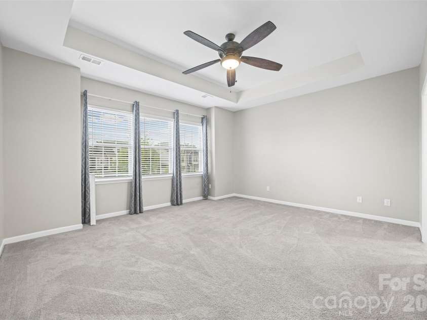 623 Amber Meadows Way, Fort Mill, SC 29708.  MLS# CAR4402607, YatesRealty ID 36714. Primary Bedroom with large windows and natural light