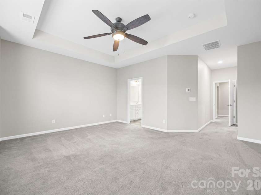 623 Amber Meadows Way, Fort Mill, SC 29708.  MLS# CAR4402607, YatesRealty ID 36714. Primary Bedroom with Tray Ceiling