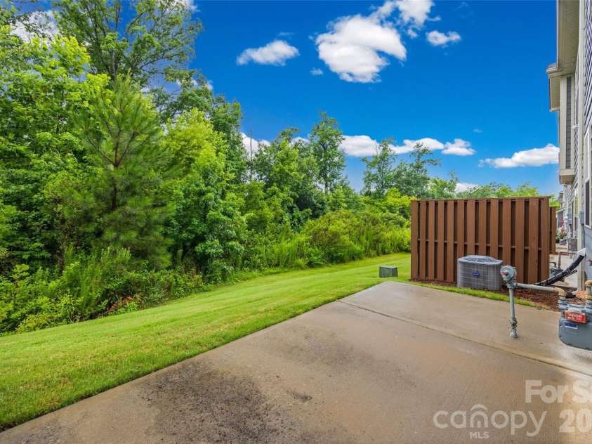 623 Amber Meadows Way, Fort Mill, SC 29708.  MLS# CAR4402607, YatesRealty ID 36714. Private Back Patio overlooking common area