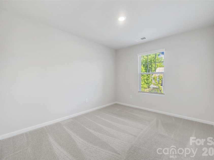 711 Still Oak Trail, Fort Mill, SC 29708.  MLS# CAR4385661, YatesRealty ID 36715. Bedroom #3 Empty
