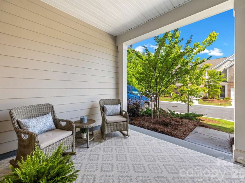 711 Still Oak Trail, Fort Mill, SC 29708.  MLS# CAR4385661, YatesRealty ID 36715. Charming covered porch