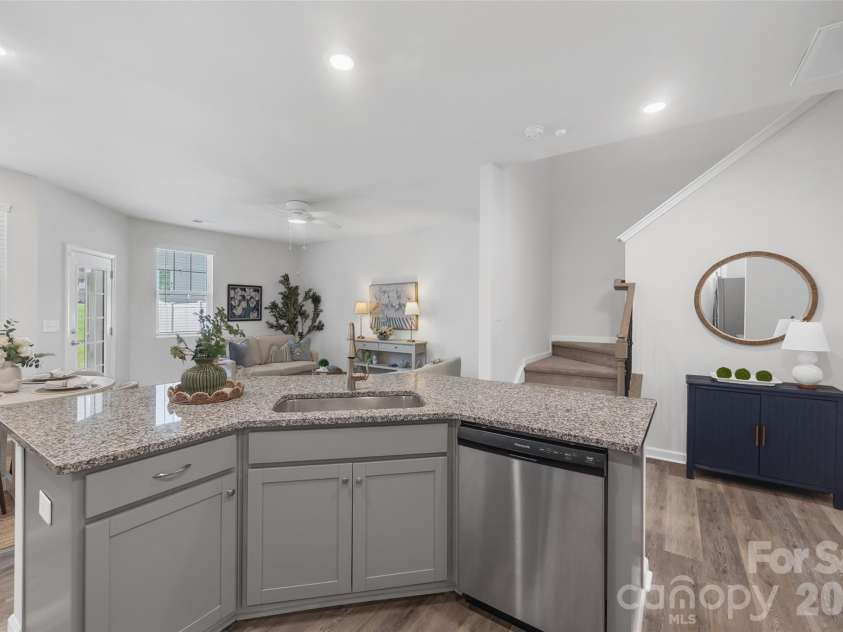 711 Still Oak Trail, Fort Mill, SC 29708.  MLS# CAR4385661, YatesRealty ID 36715. Island overlooking entire space