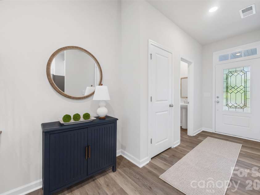 711 Still Oak Trail, Fort Mill, SC 29708.  MLS# CAR4385661, YatesRealty ID 36715. Light-filled entry sets the tone for the home