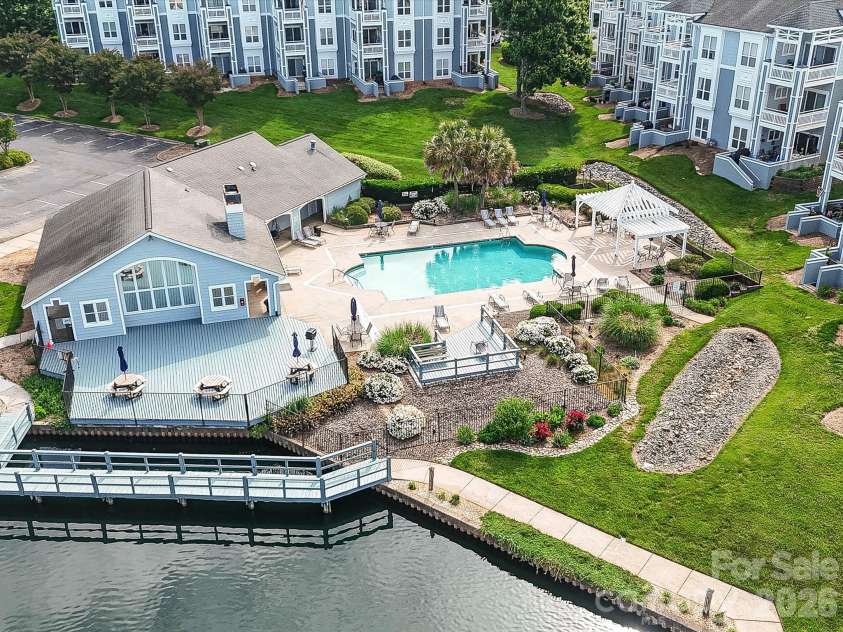 18817 Nautical Drive, Cornelius, NC 28031.  MLS# CAR4402738, YatesRealty ID 36724. Resort-style amenities include a beautifully maintained community pool surrounded by inviting outdoor gathering spaces.