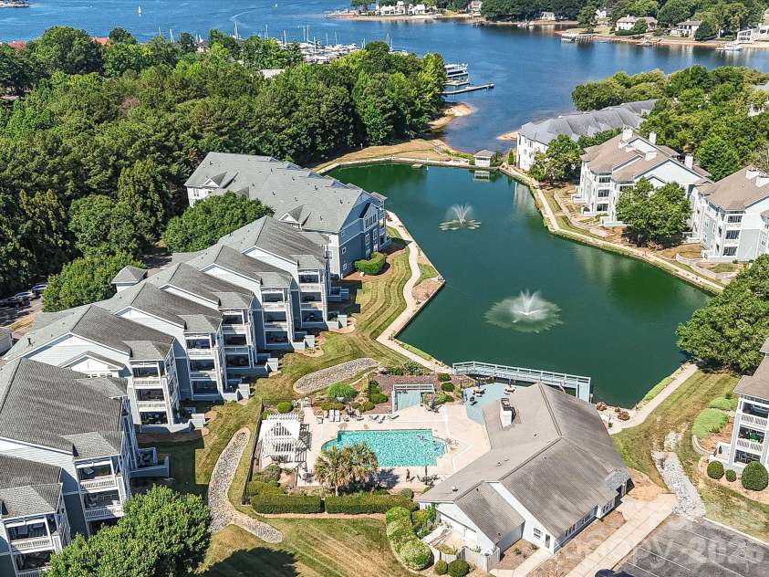 18817 Nautical Drive, Cornelius, NC 28031.  MLS# CAR4402738, YatesRealty ID 36724. Resort-style amenities include a beautifully maintained community pool, tranquil pond, surrounded by Lake Norman.