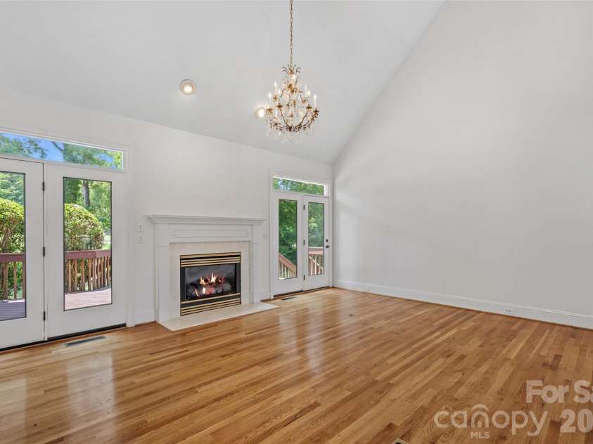 19322 River Falls Drive, Davidson, NC 28036.  MLS# CAR4400666, YatesRealty ID 36729. Great Room with access to rear deck