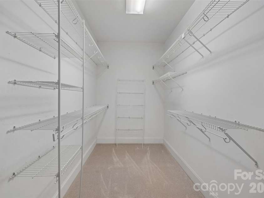 19322 River Falls Drive, Davidson, NC 28036.  MLS# CAR4400666, YatesRealty ID 36729. Walk-in Closet for Primary Bedroom