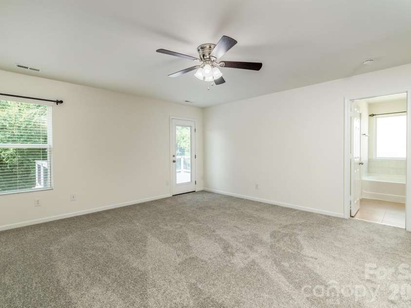 8212 Ruby Valley Road, Charlotte, NC 28277.  MLS# CAR4400467, YatesRealty ID 36734. Master bed Room walkout to Deck area