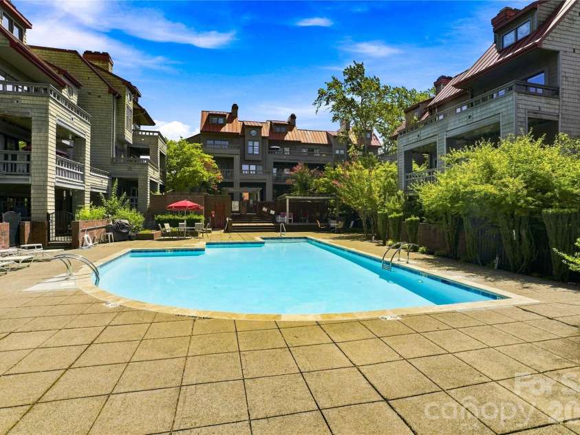 9031 J M Keynes Drive, Charlotte, NC 28262.  MLS# CAR4406099, YatesRealty ID 36738. Community pool