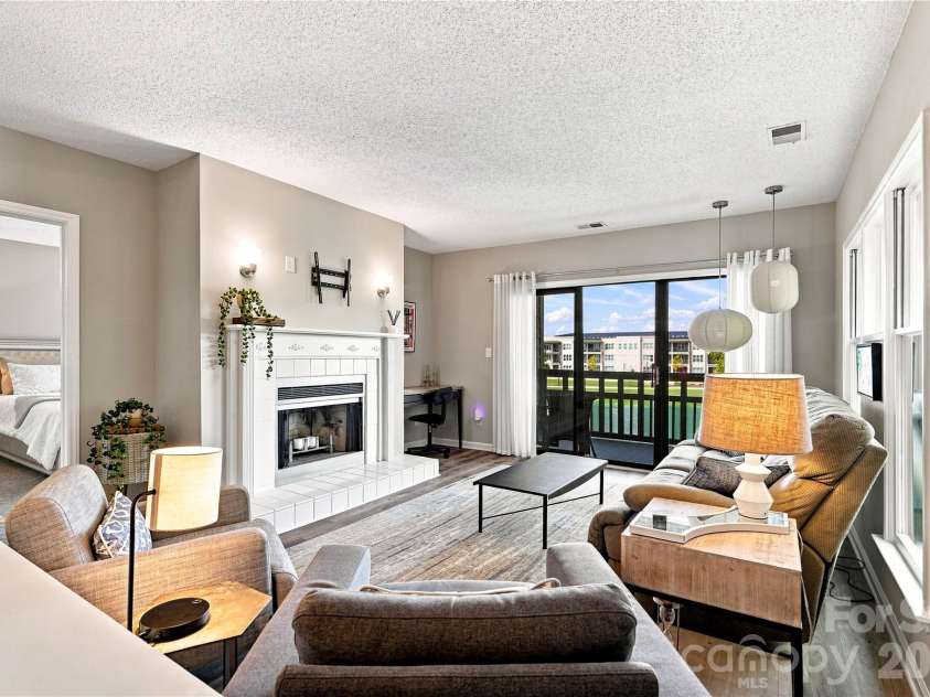 9031 J M Keynes Drive, Charlotte, NC 28262.  MLS# CAR4406099, YatesRealty ID 36738. Large great room with stunning view