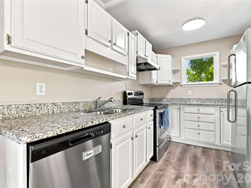 9031 J M Keynes Drive, Charlotte, NC 28262.  MLS# CAR4406099, YatesRealty ID 36738. Stainless appliances