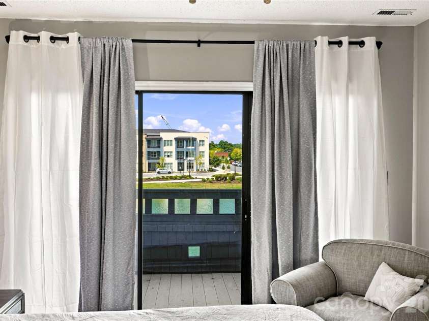 9031 J M Keynes Drive, Charlotte, NC 28262.  MLS# CAR4406099, YatesRealty ID 36738. Stunning view off primary