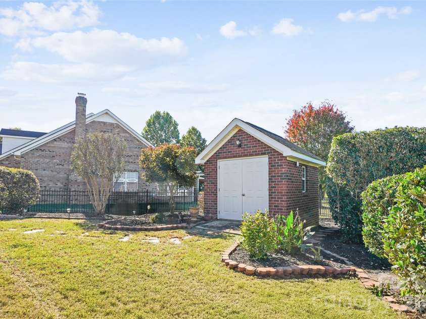 842 Treva Anne Drive, Concord, NC 28027.  MLS# CAR4317215, YatesRealty ID 3674. Backyard