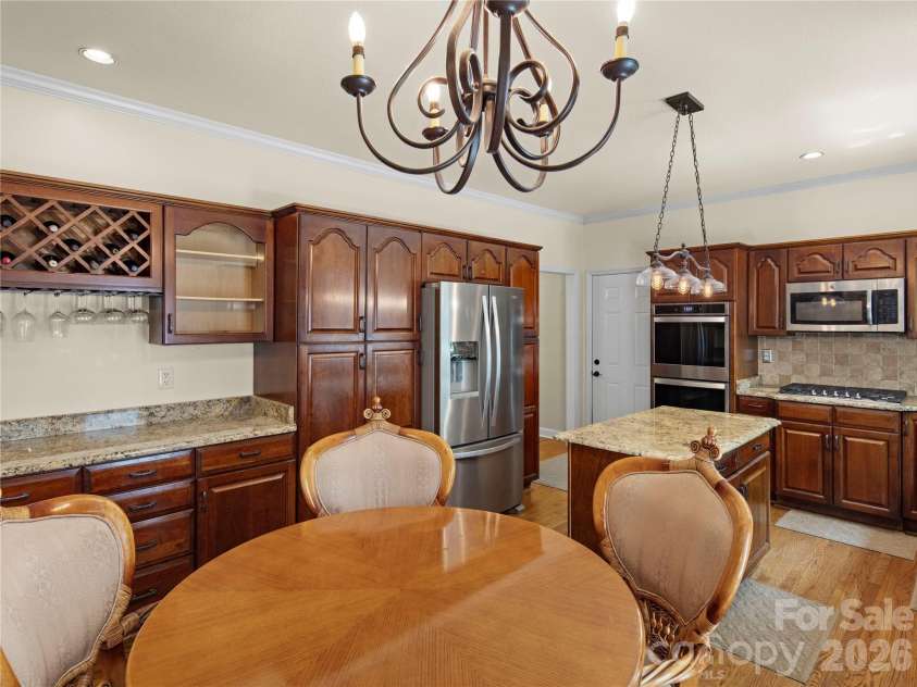 105 Braeside Circle, Asheville, NC 28803.  MLS# CAR4383221, YatesRealty ID 36740. Open kitchen and eating area