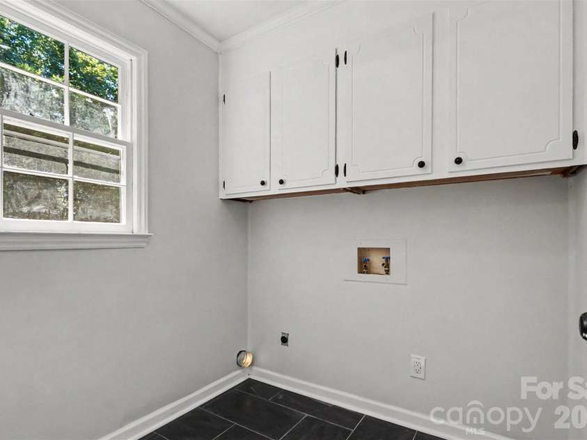 4108 Wimbledon Drive, Dallas, NC 28034.  MLS# CAR4402629, YatesRealty ID 36742. Laundry Room on Main Floor
