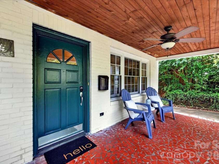 1808 Truman Road, Charlotte, NC 28205.  MLS# CAR4397533, YatesRealty ID 36754. Covered rocking chair front porch