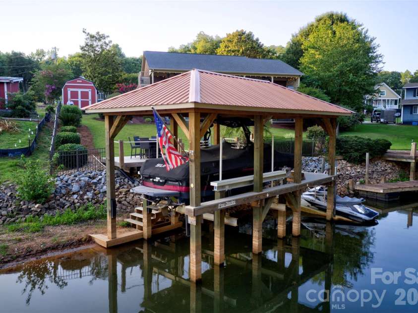 8535 Sylvan Drive, Terrell, NC 28682.  MLS# CAR4396281, YatesRealty ID 36760. Covered Dock with Boat Lift