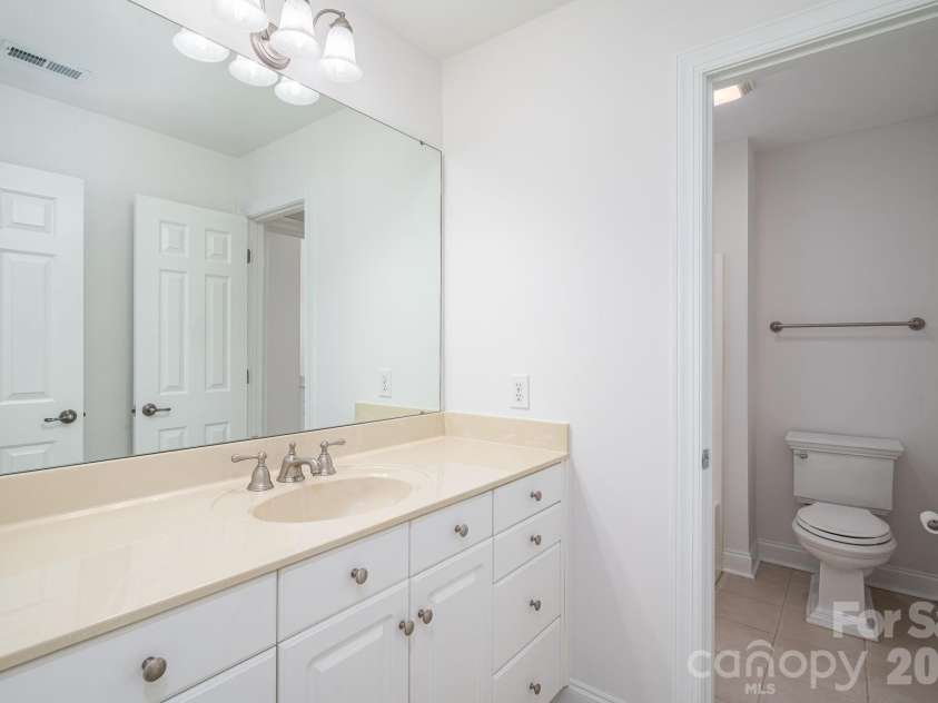4017 Foxes Trail, Cramerton, NC 28032.  MLS# CAR4392381, YatesRealty ID 36768. Upstairs Jack and Jill with separate vanities.