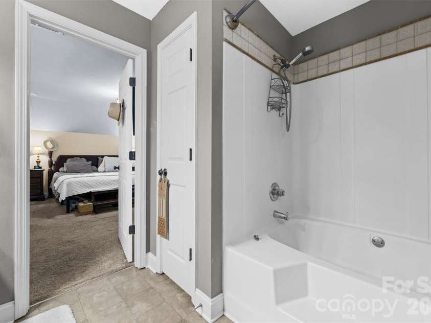 315 Honey Locust Lane, Whittier, NC 28789.  MLS# CAR4403024, YatesRealty ID 36770. Primary Bathroom