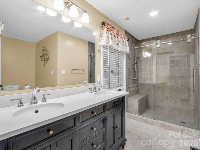 1810 Arbor Way Drive, Shelby, NC 28150.  MLS# CAR4392549, YatesRealty ID 36778. Large primary bath with double vanity, large tile shower
