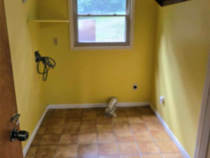 813 Robinson Clemmer Road, Dallas, NC 28034.  MLS# CAR4400860, YatesRealty ID 36784. Guest cottage laundry room view from kitchen