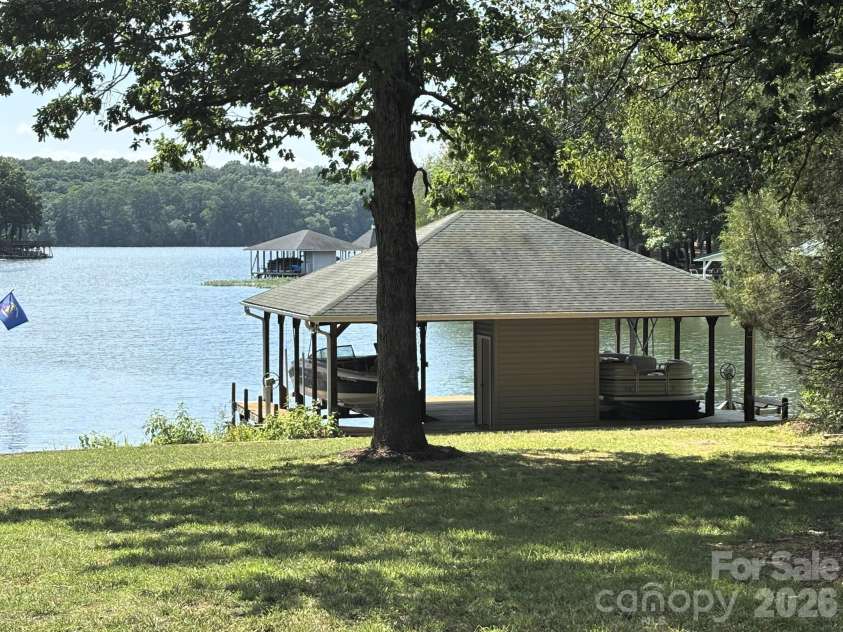 130 Canoe Court, Mount Gilead, NC 27306.  MLS# CAR4400919, YatesRealty ID 36795. Double Boat Lift and Dock