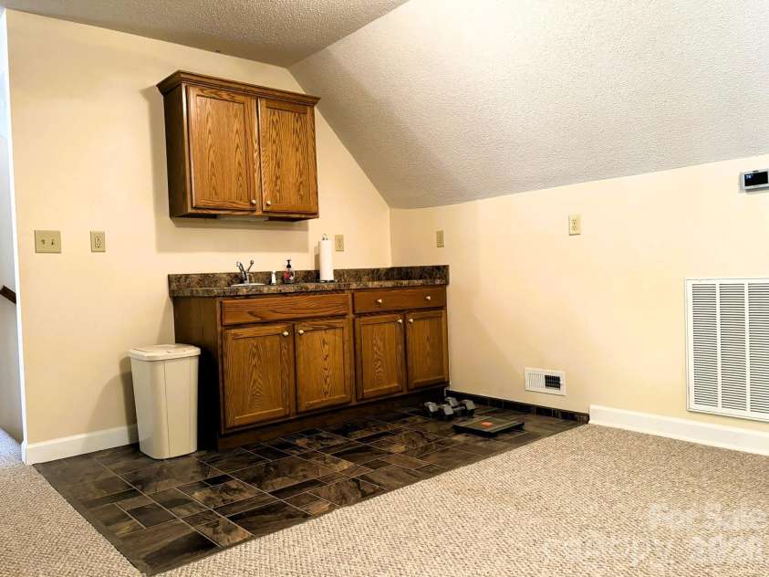 130 Canoe Court, Mount Gilead, NC 27306.  MLS# CAR4400919, YatesRealty ID 36795. Kitchenette upstairs