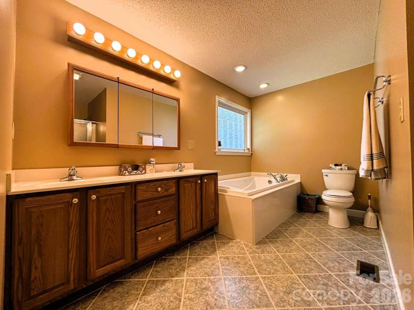 130 Canoe Court, Mount Gilead, NC 27306.  MLS# CAR4400919, YatesRealty ID 36795. Master Bathroom