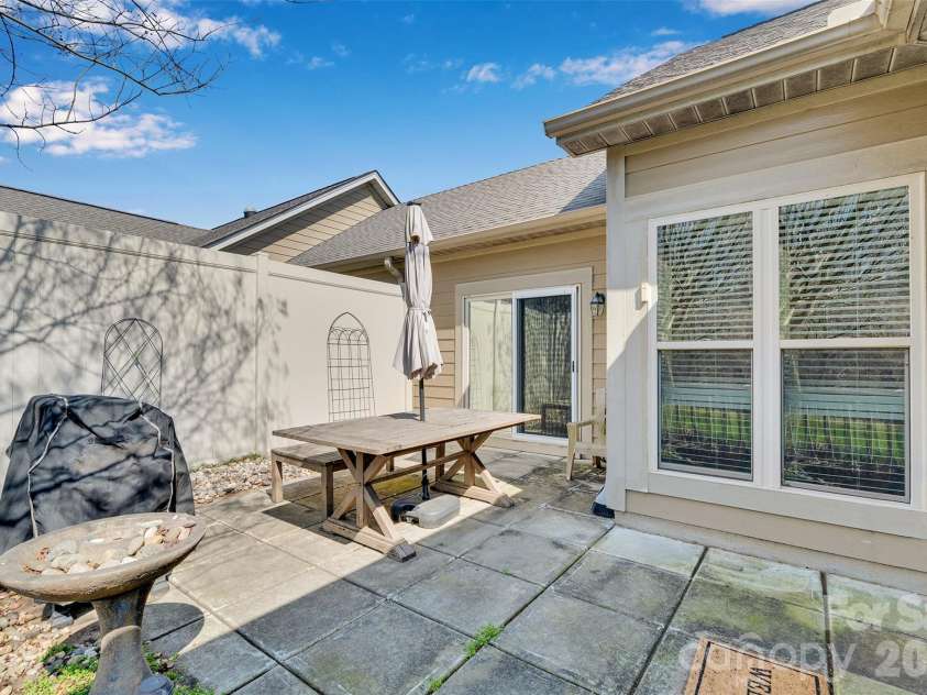 4767 Polo Gate Boulevard, Charlotte, NC 28216.  MLS# CAR4354424, YatesRealty ID 3680. Back Patio