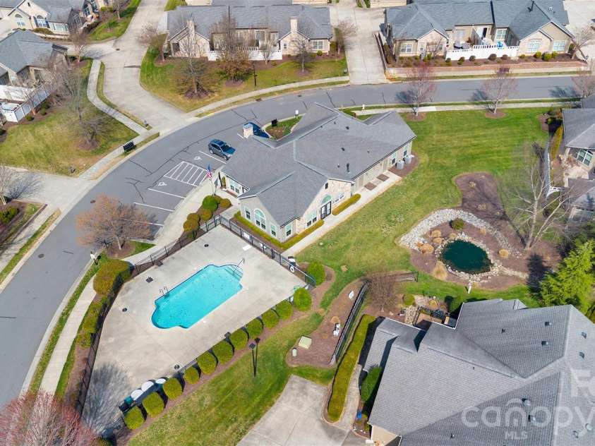 4767 Polo Gate Boulevard, Charlotte, NC 28216.  MLS# CAR4354424, YatesRealty ID 3680. Clubhouse and pool