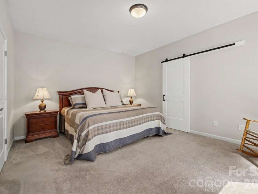 24562 Blue Heron Circle, Lancaster, SC 29720.  MLS# CAR4402586, YatesRealty ID 36802. Primary Suite w/ Barn Door