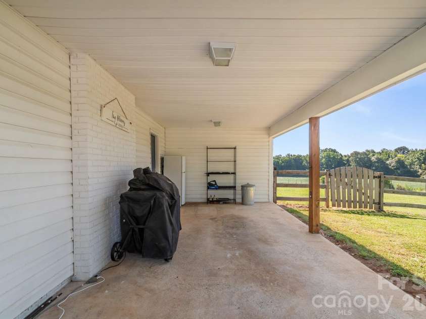 2307 Tanner Road, Marshville, NC 28103.  MLS# CAR4397645, YatesRealty ID 36814. Carport