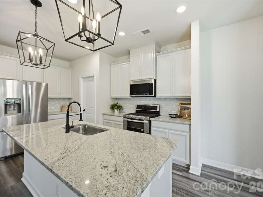 5110 Turtle Creek Drive, Denver, NC 28037.  MLS# CAR4399103, YatesRealty ID 36826. New lighting in the kitchen