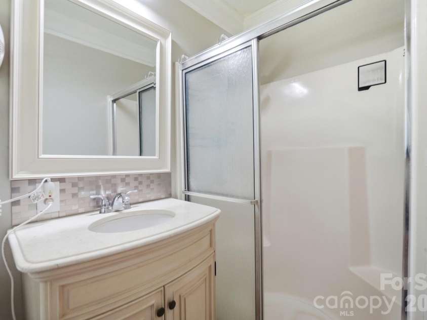 107 Mistywood Drive, Mount Holly, NC 28120.  MLS# CAR4400826, YatesRealty ID 36827. Primary full bathroom
