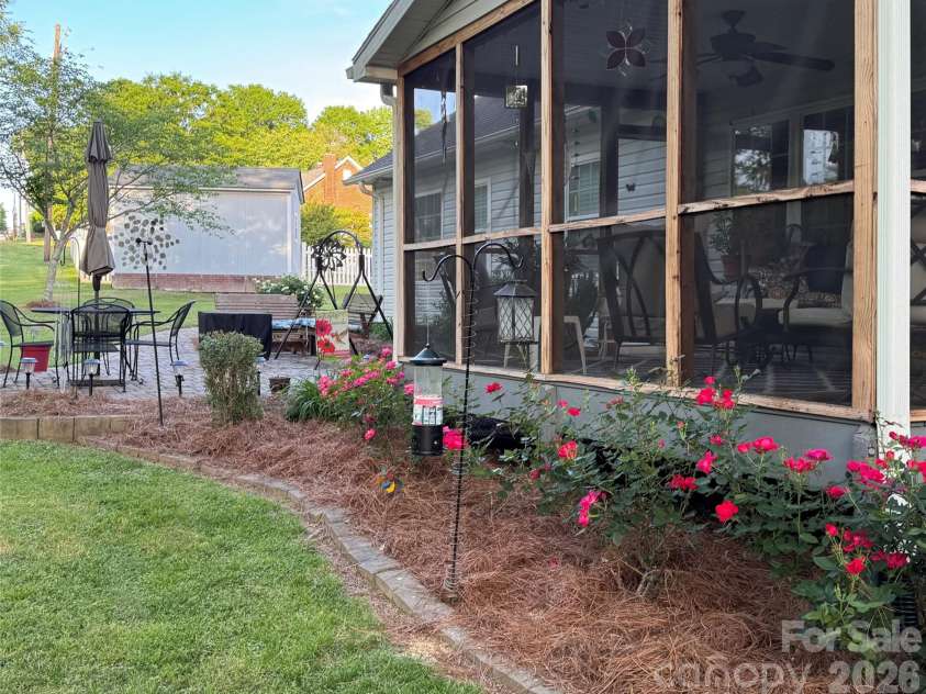 563 Marigold Drive, Kannapolis, NC 28083.  MLS# CAR4401895, YatesRealty ID 36828. Backyard - Screened in Porch