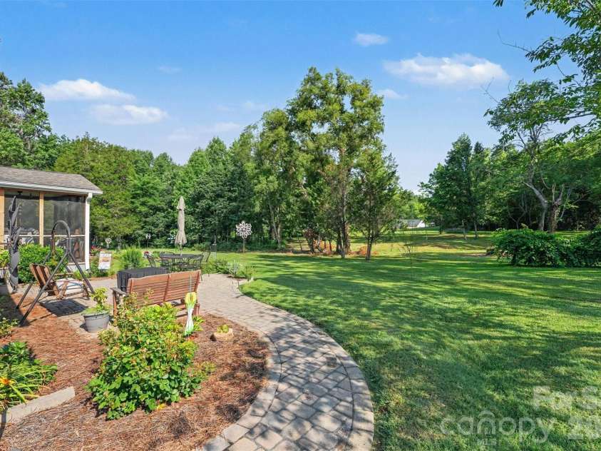 563 Marigold Drive, Kannapolis, NC 28083.  MLS# CAR4401895, YatesRealty ID 36828. Walkway to Backyard